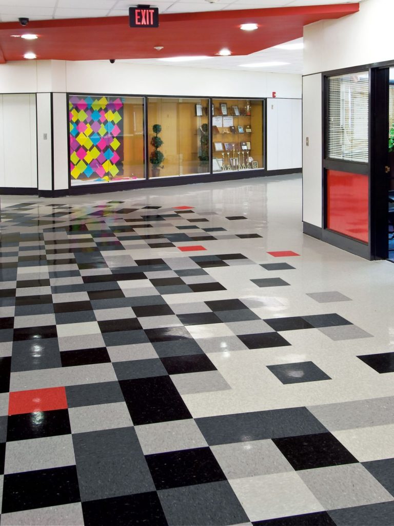 Commercial VCT flooring in a school hallway near Boston